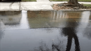 Water main leaking in roadway