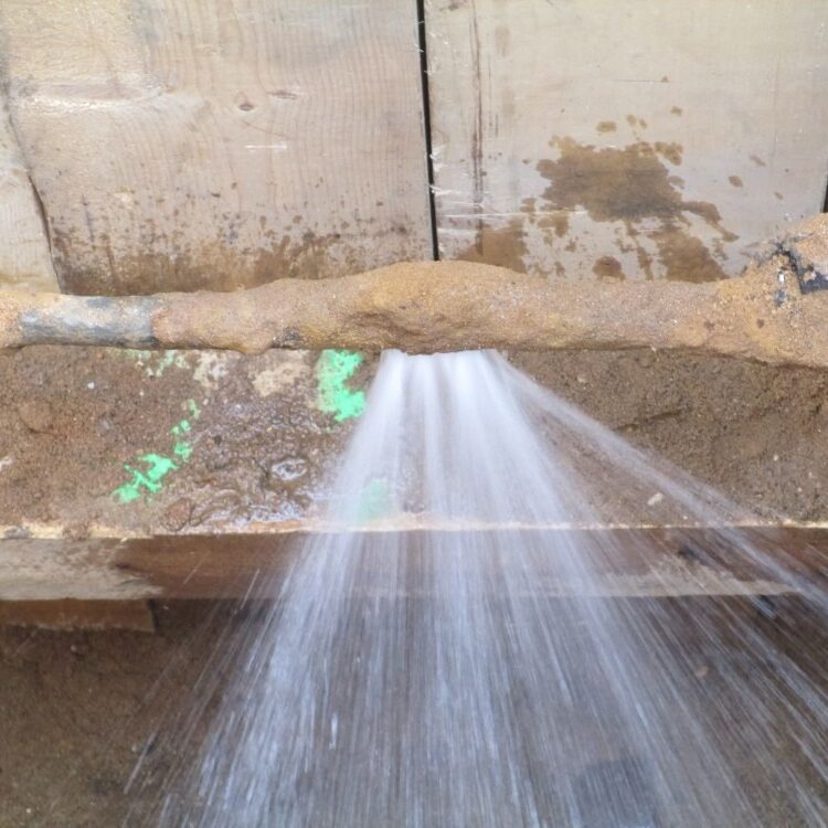 Lead water main leak