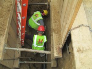 Installing pipe under stoop