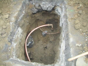 New copper pipe in ground