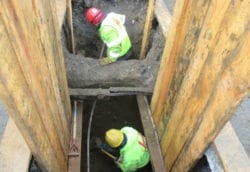 Hand dig around utilities Manhattan