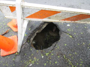 Roadway sinkhole sewer line