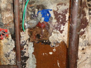 Leaking water main at foundation wall