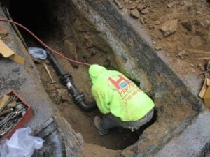 Installing water main off sets