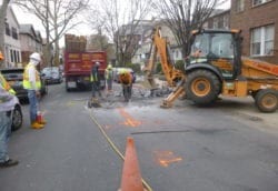 Jack hammer roadway for sewer repair