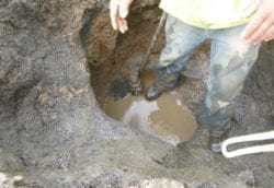 Leaking water main tap connection