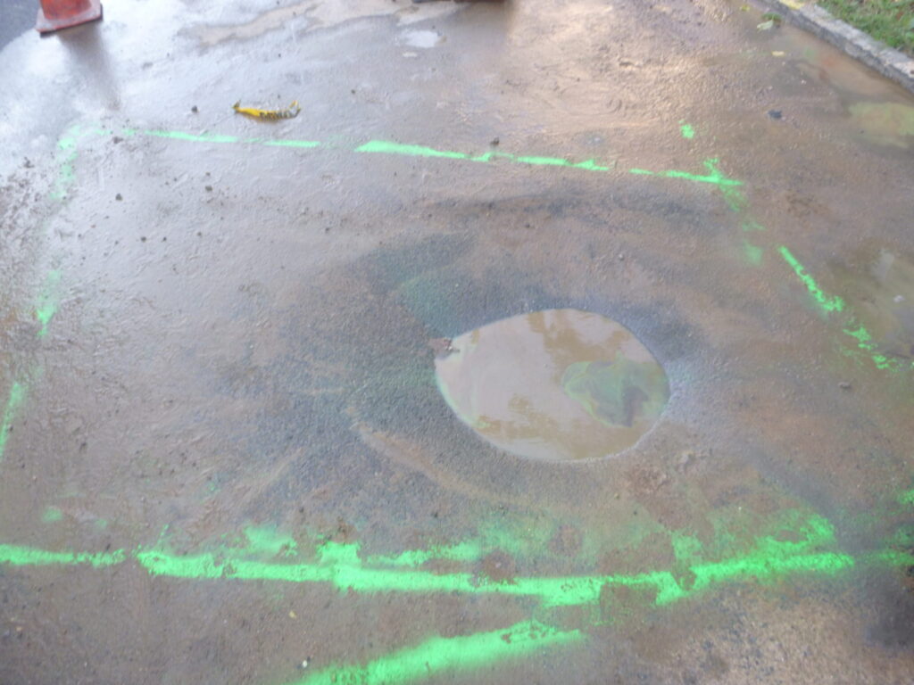 Street sinkhole from broken sewer