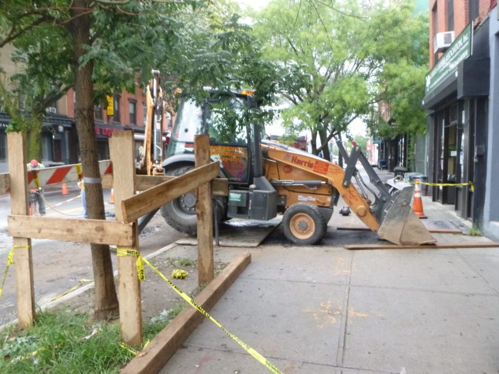 Digging on sidewalk