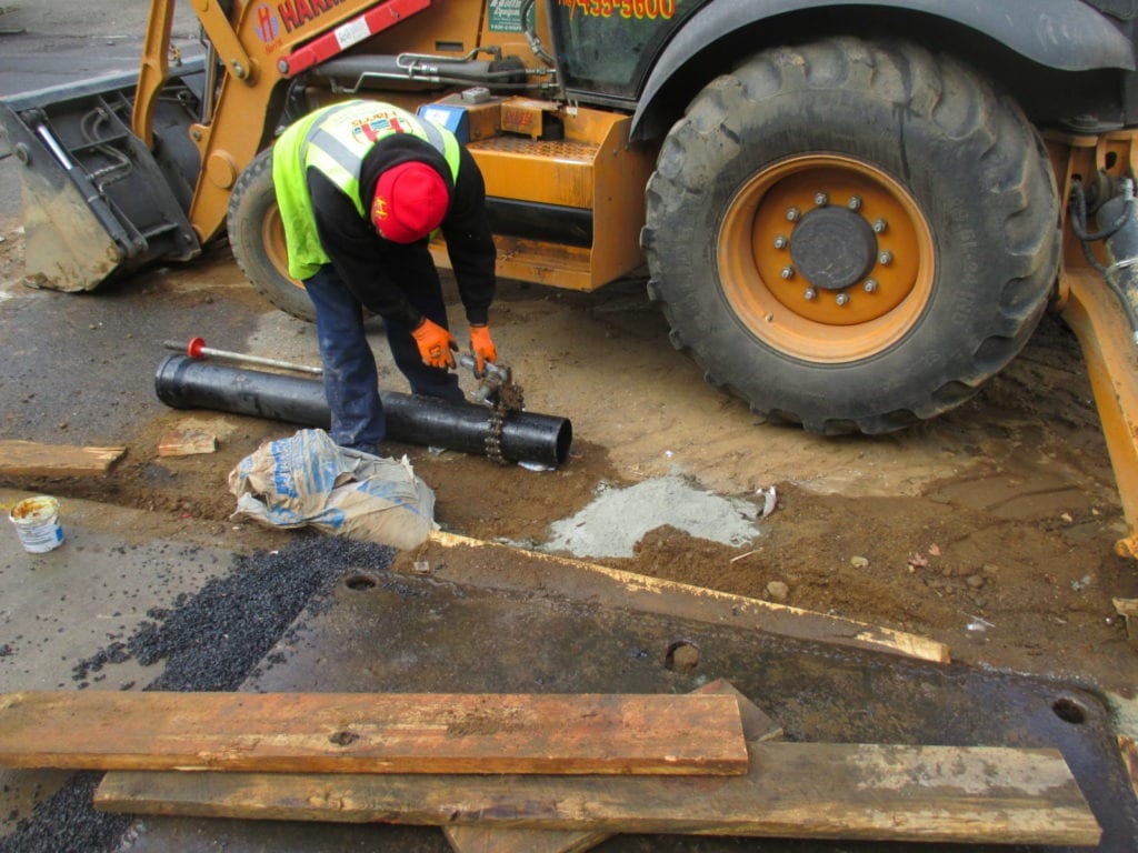 Cutting cast iron pipe for new sewer