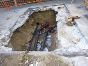 Trenching for ductile iron pipe