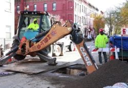 Sewer repair excavation with backhoe