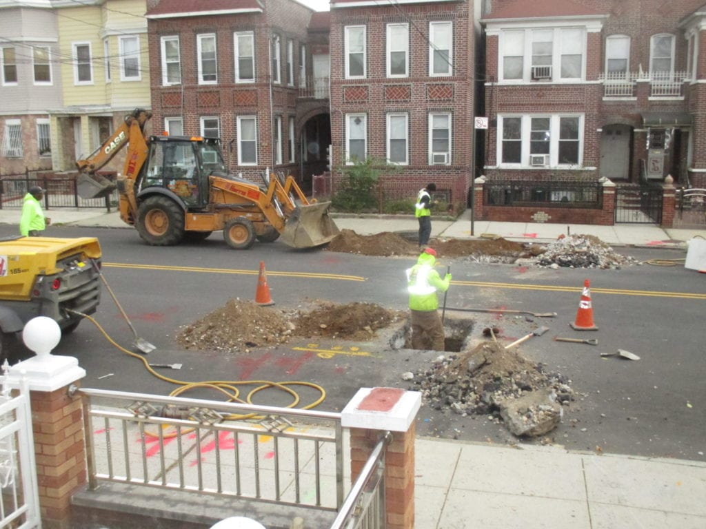 Installing water main from opposite side of the street