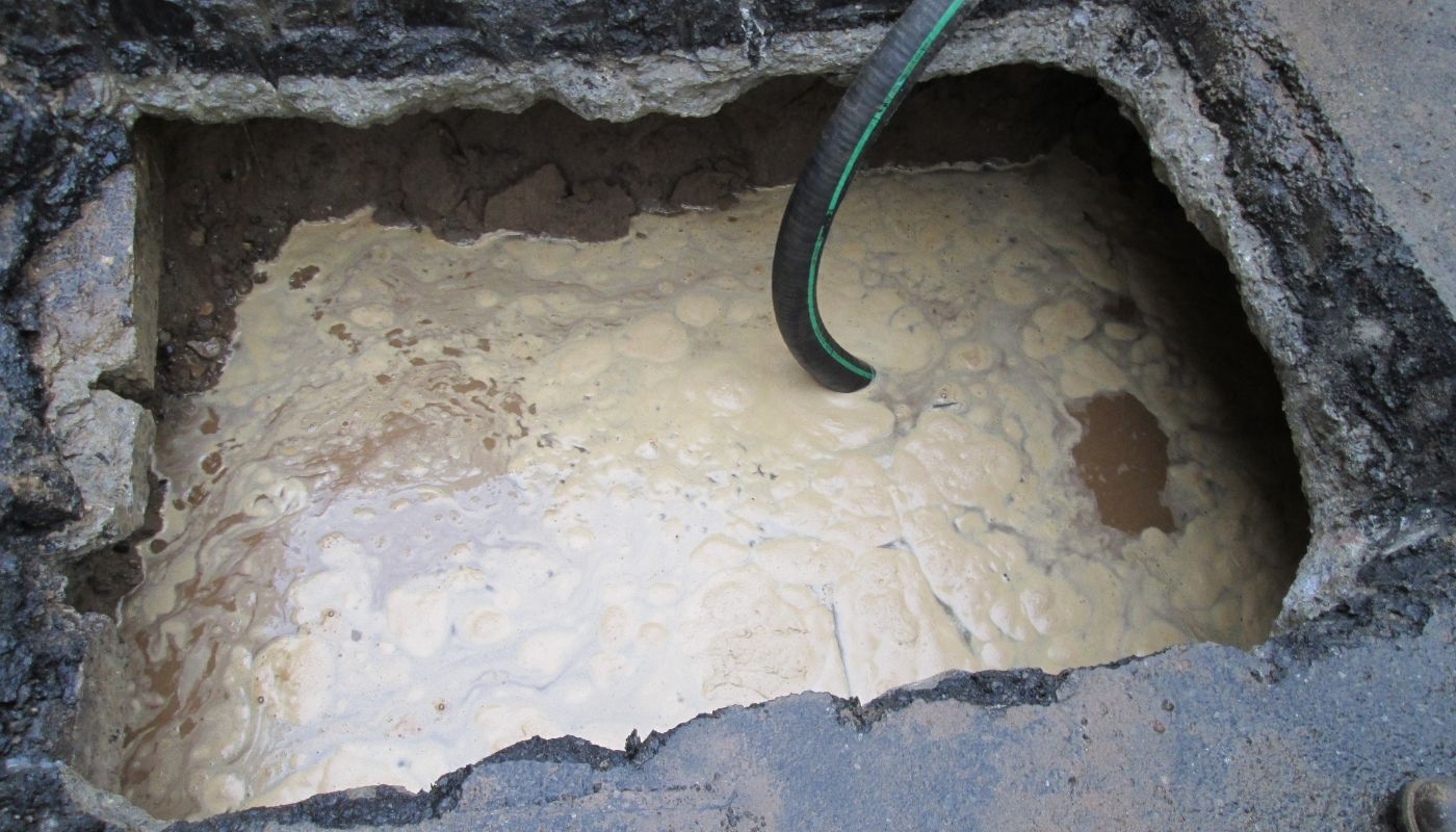tube-in-water-hole-on-the-street
