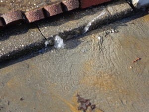 water-leak-at-curb-300x225