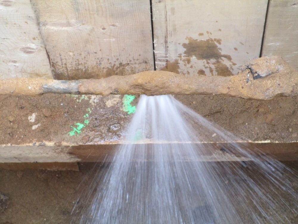Lead water main leak