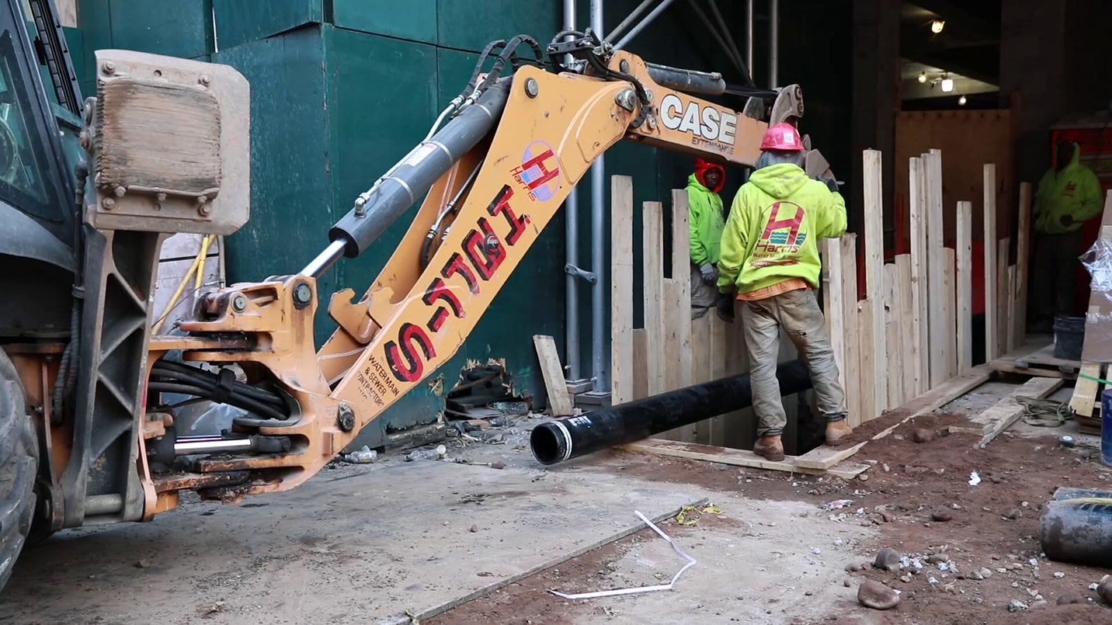 pipe-being-installed-with-machinery