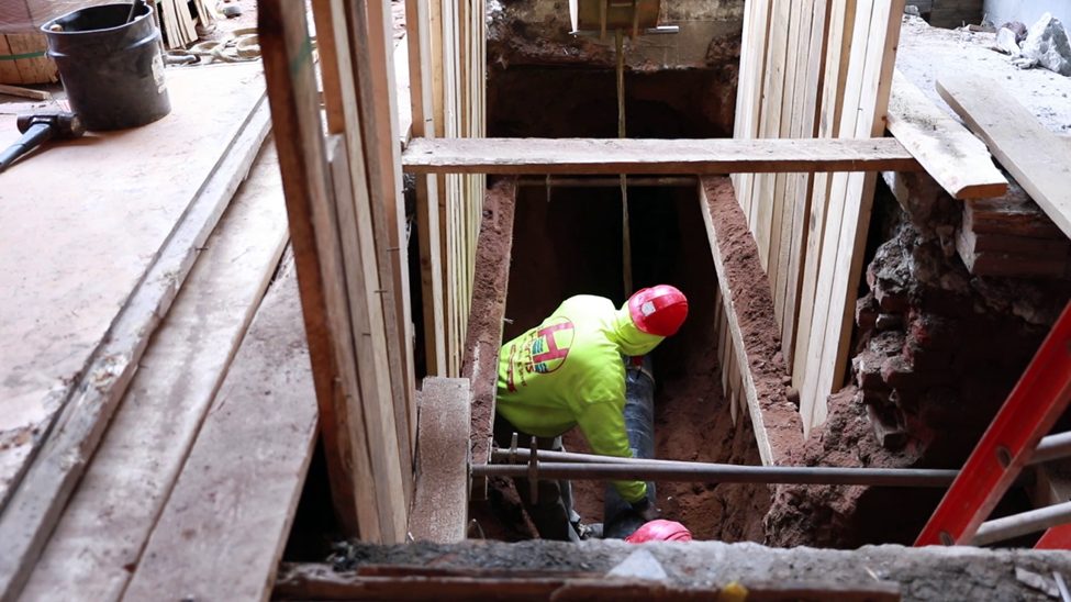 Harris Water Main and Sewer contractor working on a house sewer installation