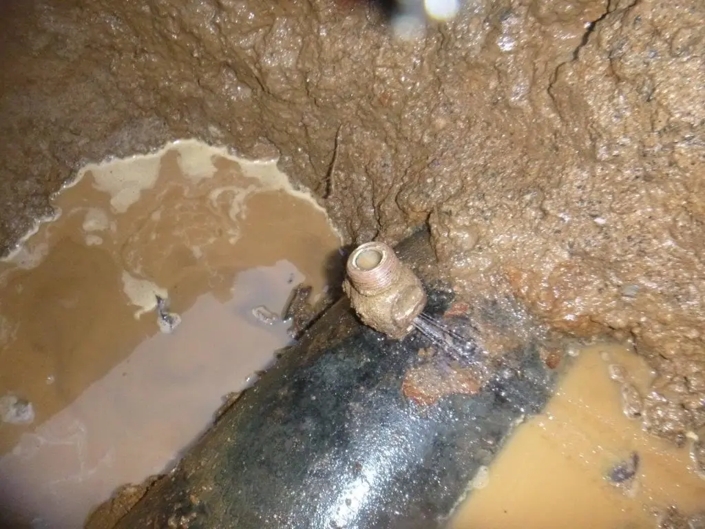 Image of a leaky faucet, highlighting the need for prompt water main and sewer repair services